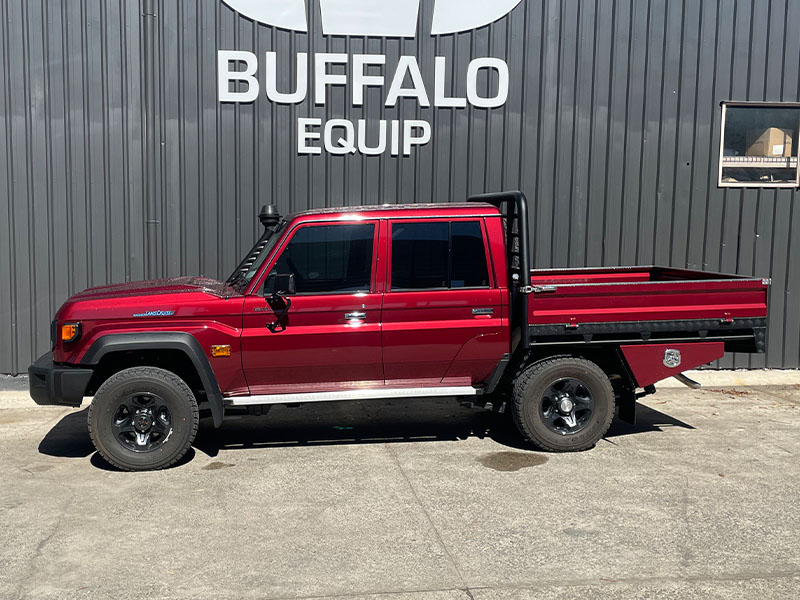 land cruiser in red with custom tray